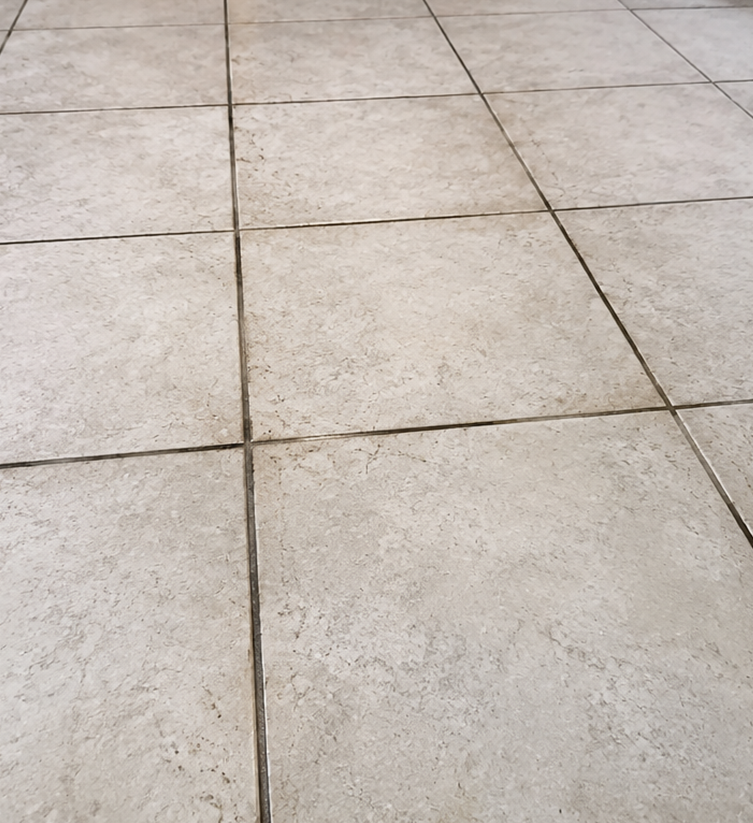 Professional tile and grout cleaning service restoring grout lines in a Lewisville home.
